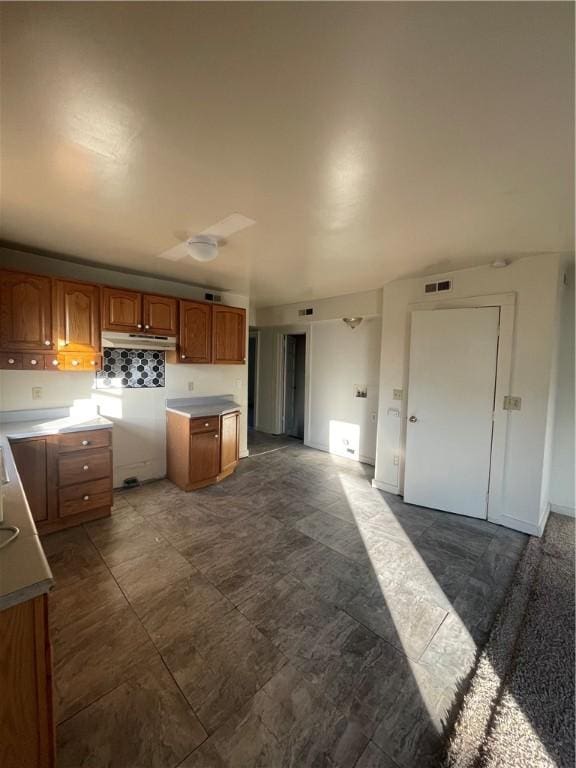 kitchen featuring tasteful backsplash