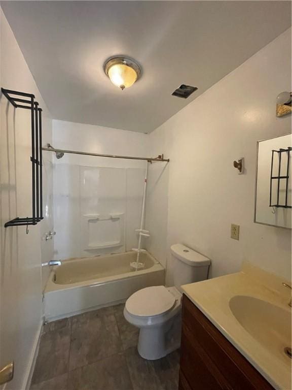 full bathroom featuring tile patterned floors, vanity, toilet, and shower / bath combination