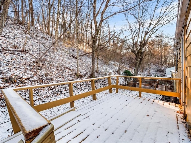 view of snow covered deck