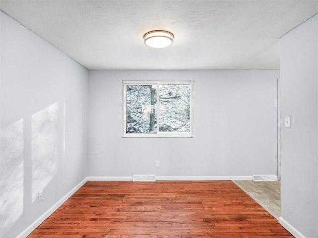 empty room featuring light wood-type flooring