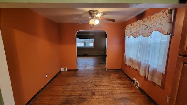 hall with hardwood / wood-style flooring