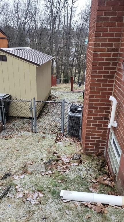 view of yard featuring central AC unit