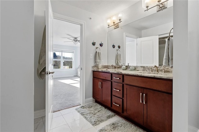 bathroom featuring vanity and ceiling fan