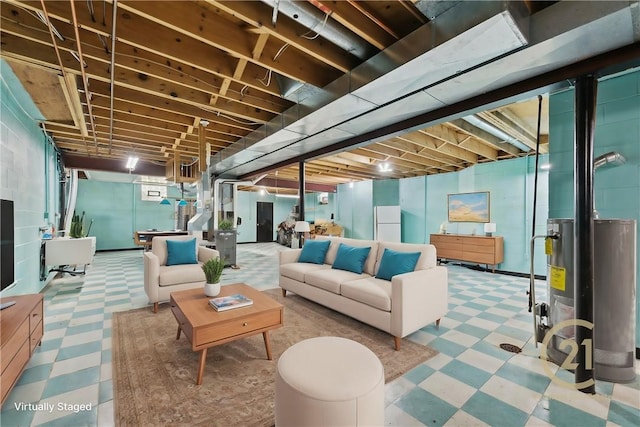 basement featuring gas water heater and white fridge