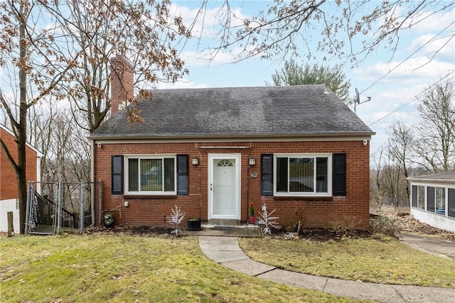 view of front of home with a front yard