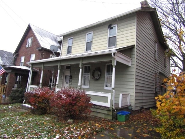 view of front facade featuring covered porch