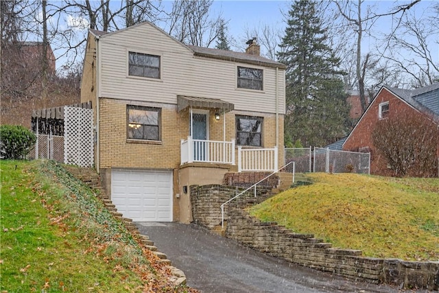 view of front property with a garage