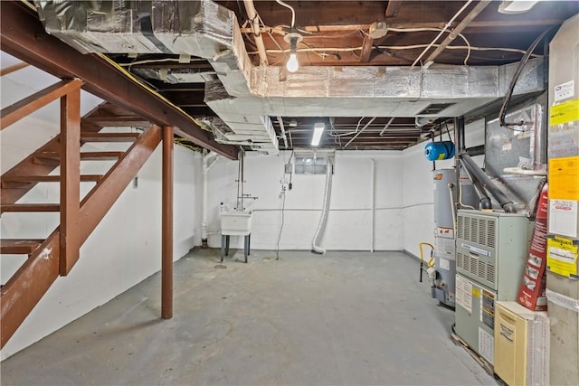 basement with sink and water heater