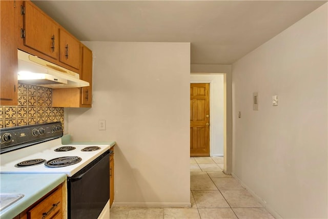 kitchen featuring backsplash, sink, light tile patterned flooring, and white electric range