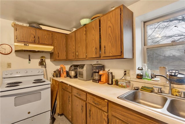 kitchen featuring sink and white electric stove