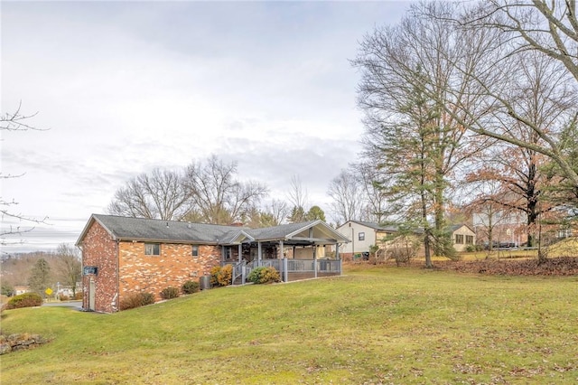 exterior space with a lawn