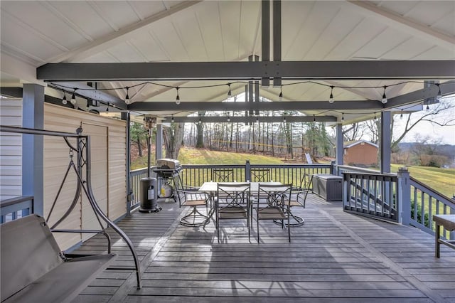 wooden terrace featuring a gazebo and area for grilling