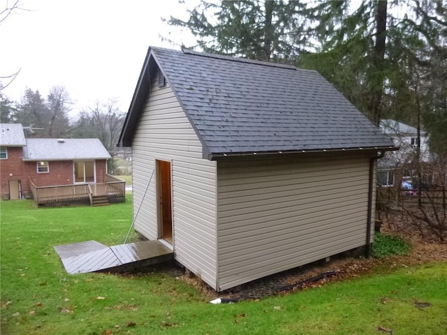 view of outdoor structure featuring a yard