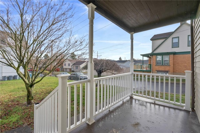 balcony featuring a porch