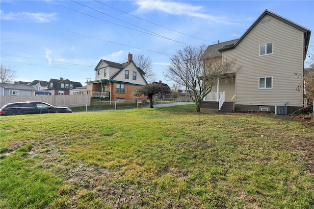 view of yard featuring central AC unit