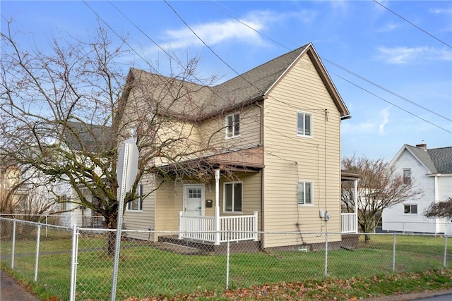 view of front of house featuring a front lawn and a porch