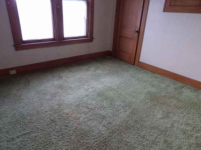 view of carpeted spare room