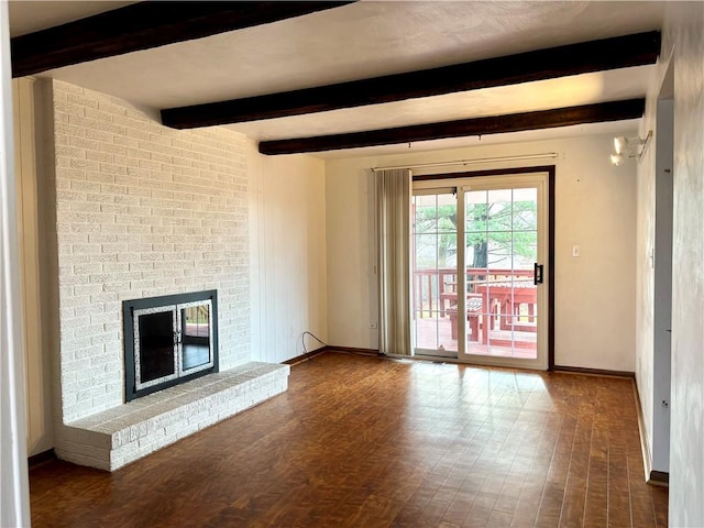 unfurnished living room with beam ceiling, dark hardwood / wood-style flooring, and a fireplace