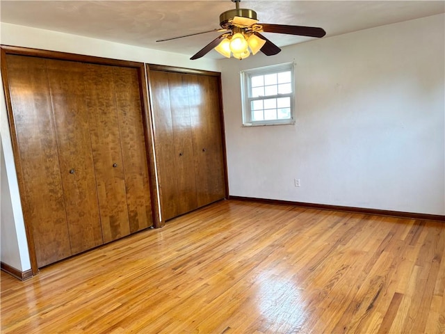 unfurnished bedroom with light wood-type flooring and ceiling fan