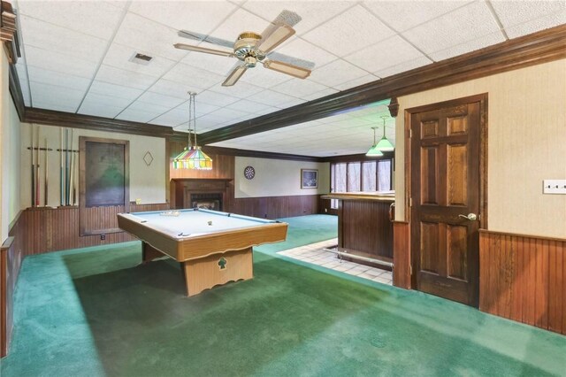 playroom with billiards, carpet floors, indoor bar, a paneled ceiling, and ornamental molding