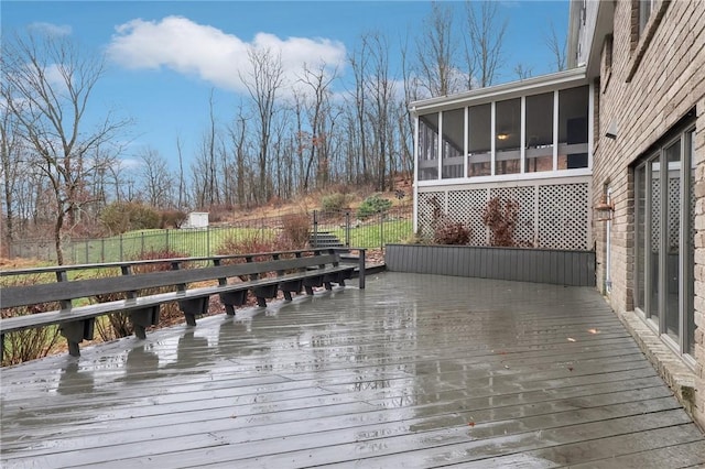 deck with a sunroom