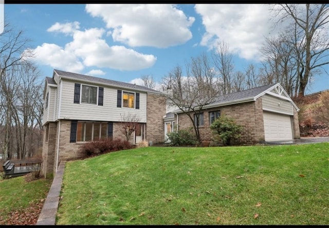 view of front of property with aphalt driveway, brick siding, and a front lawn