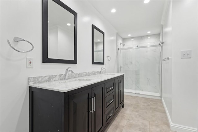 bathroom with tile patterned floors, vanity, and an enclosed shower