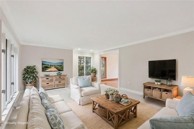 carpeted living room with ornamental molding