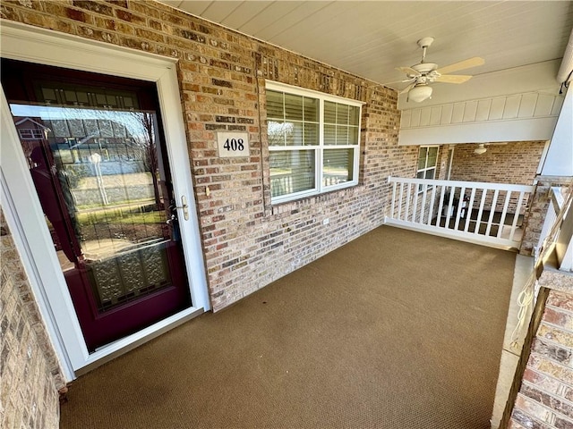 exterior space featuring ceiling fan and covered porch