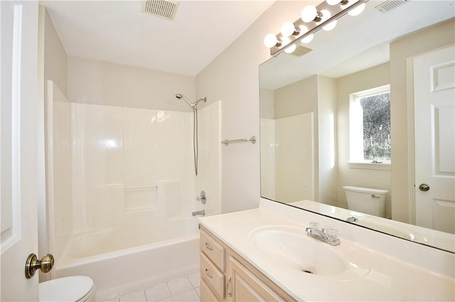 full bathroom with tile patterned flooring, vanity, tub / shower combination, and toilet