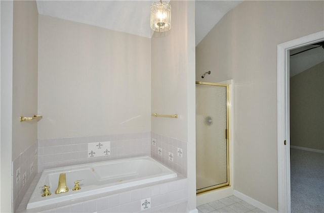 bathroom featuring tile patterned floors and shower with separate bathtub