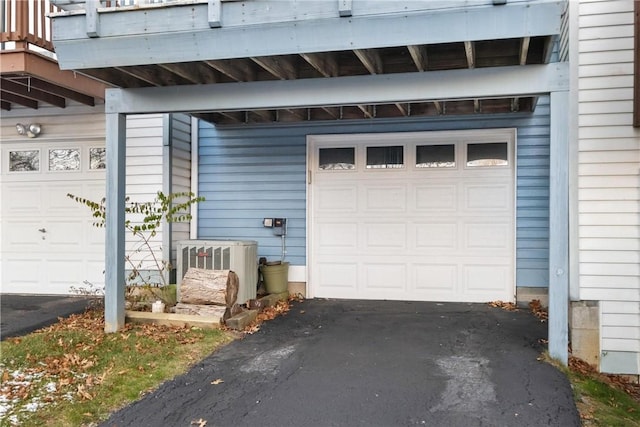 garage featuring ac unit and central AC