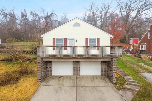 view of front of house with a garage and a front yard