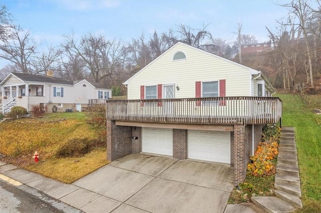 view of front facade with a front lawn and a garage