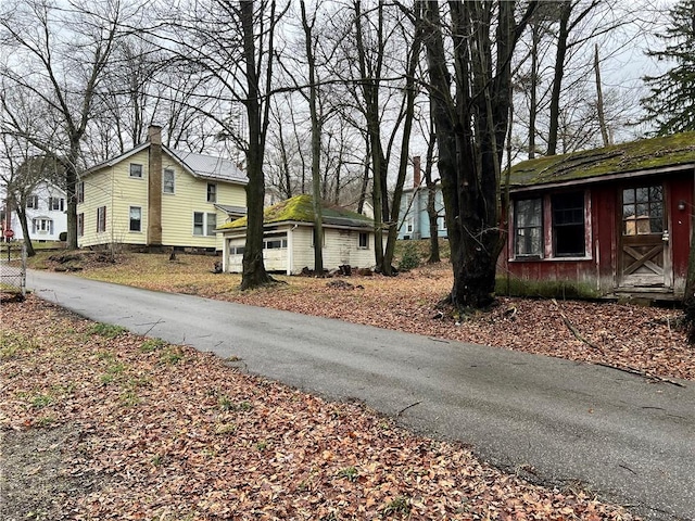 exterior space with an outbuilding