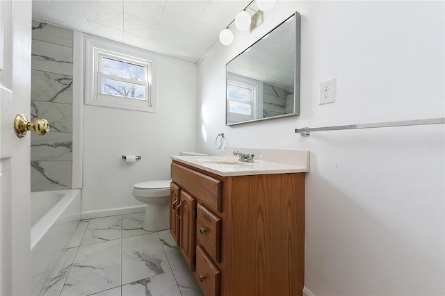 full bathroom featuring vanity, toilet, tiled shower / bath, and a healthy amount of sunlight