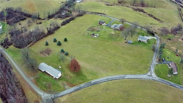 birds eye view of property featuring a rural view