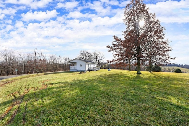 view of yard with a rural view