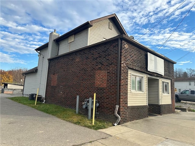 view of property exterior featuring cooling unit