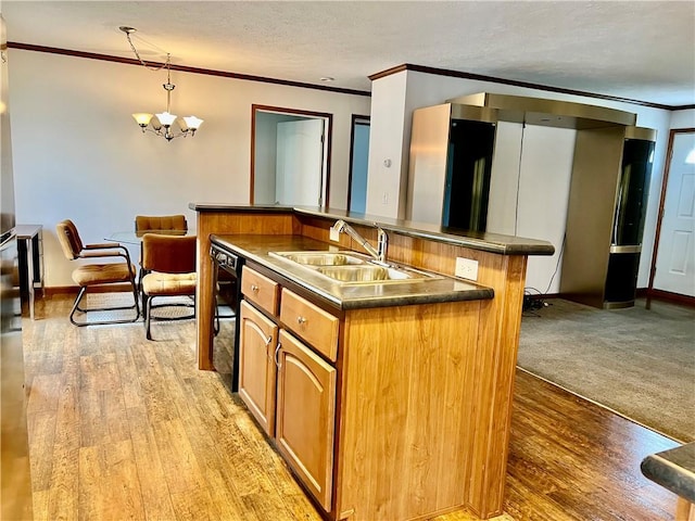 kitchen featuring dishwasher, light carpet, sink, decorative light fixtures, and a chandelier