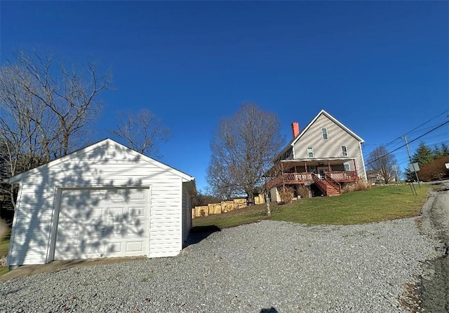 exterior space featuring a yard and covered porch