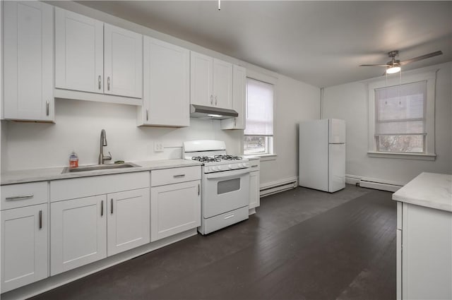 kitchen featuring white cabinetry, sink, dark hardwood / wood-style flooring, a baseboard heating unit, and white appliances