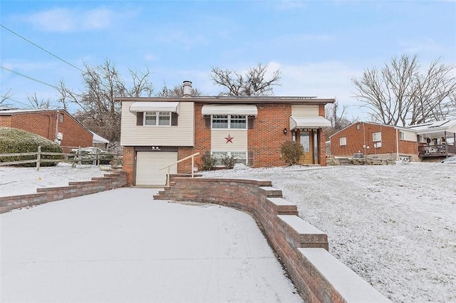 raised ranch with a garage