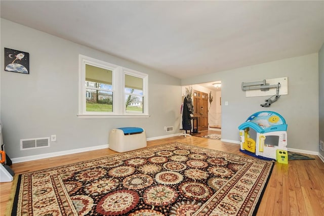 interior space with hardwood / wood-style flooring