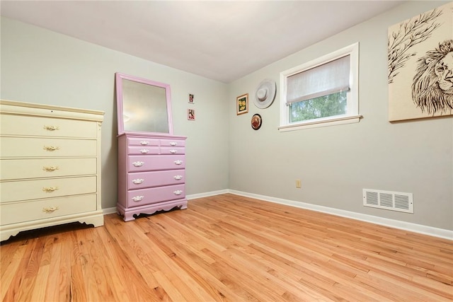 unfurnished bedroom with light hardwood / wood-style floors