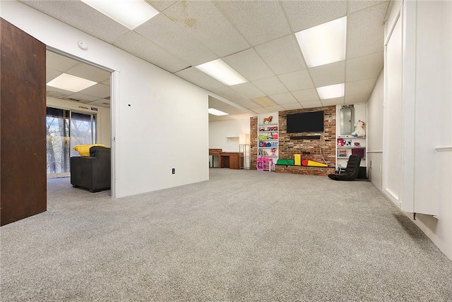 basement with carpet and a drop ceiling