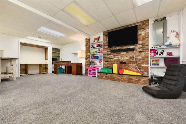 interior space featuring carpet, electric panel, and a drop ceiling