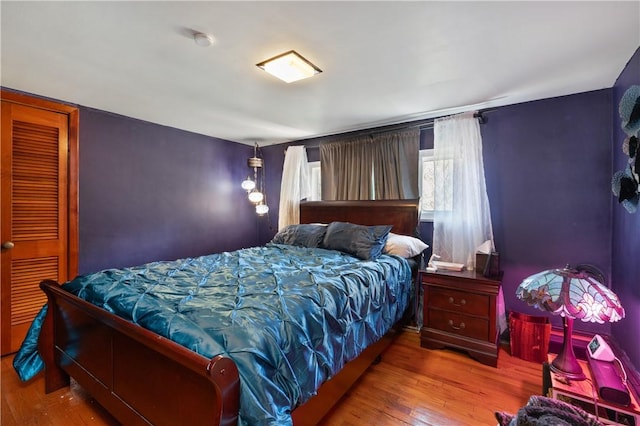 bedroom with light hardwood / wood-style flooring