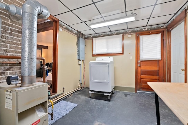 laundry area featuring electric panel and washer / clothes dryer