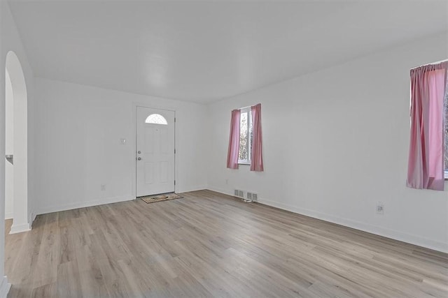 entrance foyer with light wood-type flooring